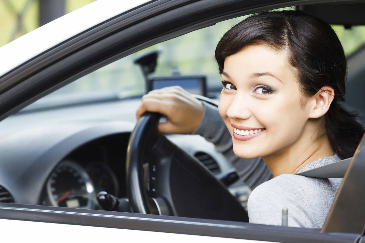 car insurance with a woman in the drivers seat in chapel hill